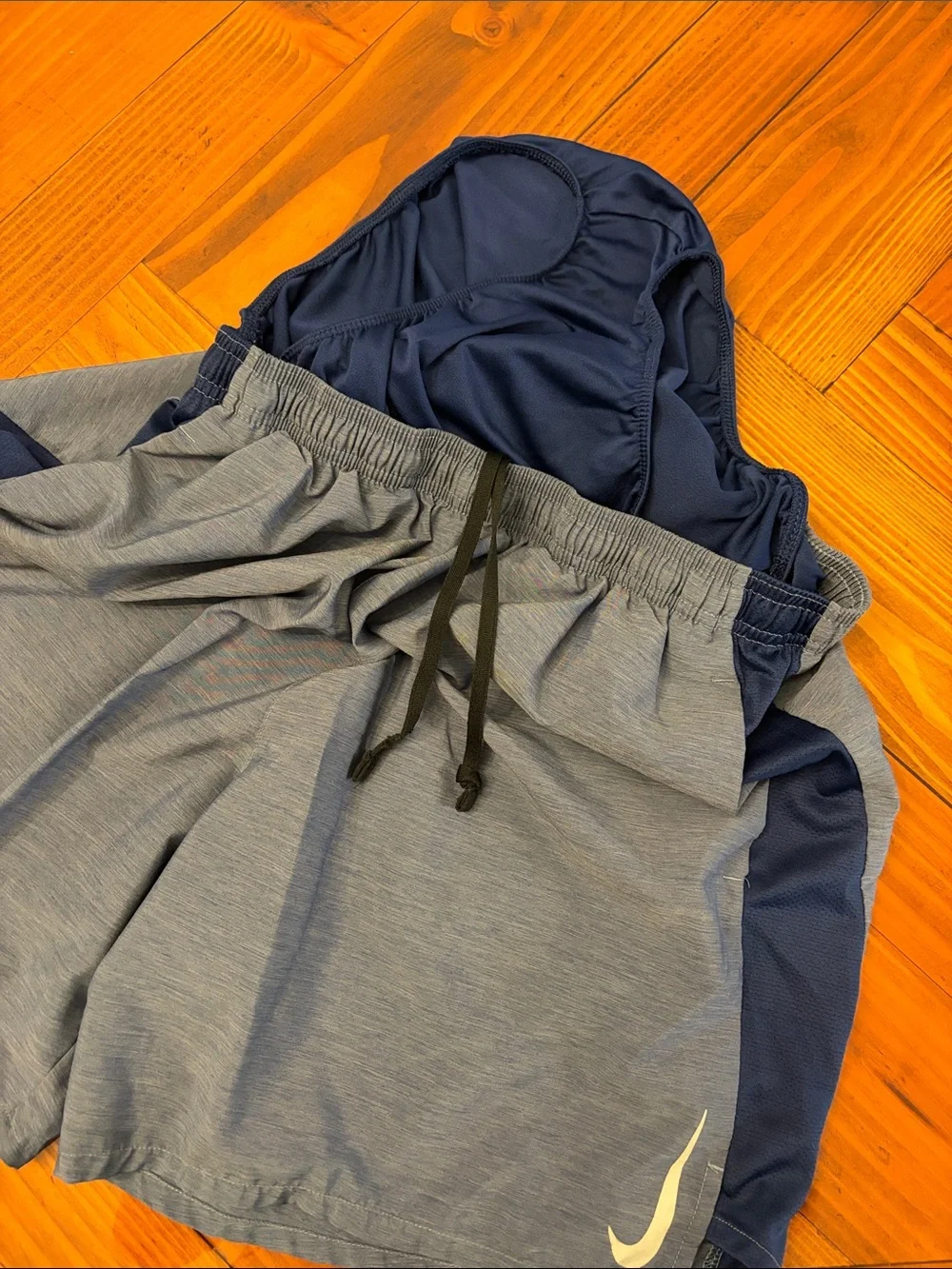 Nike Gray Shorts with Navy Side Panels and White Swoosh